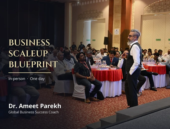 Dr. Ameet Parekh leading a live in-person Business ScaleUp Blueprint session